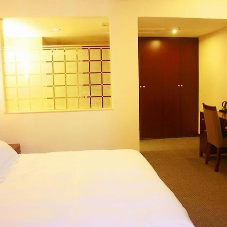 Starway Porcelain Hotel Цзиндечжен Стая снимка