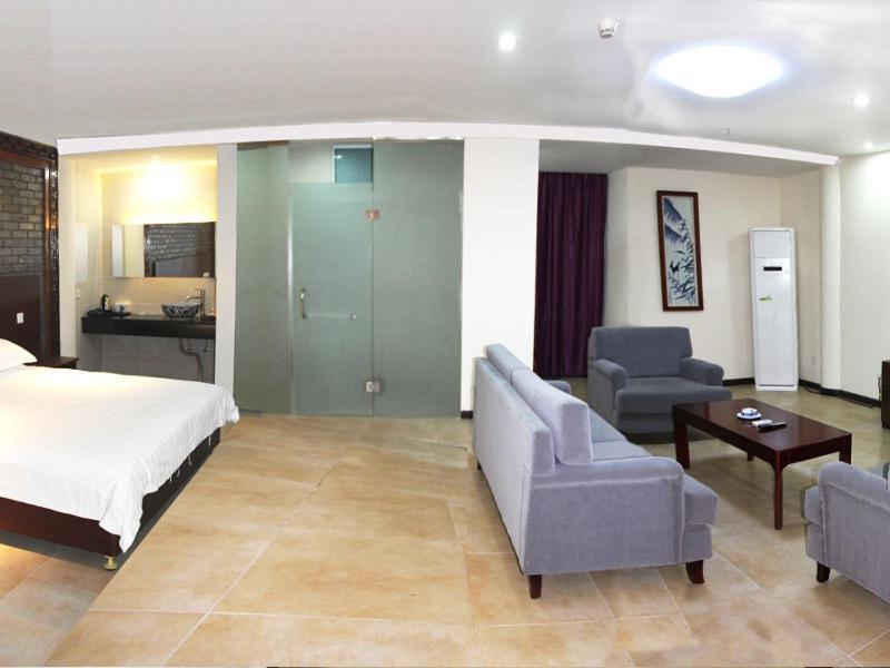 Starway Porcelain Hotel Цзиндечжен Стая снимка